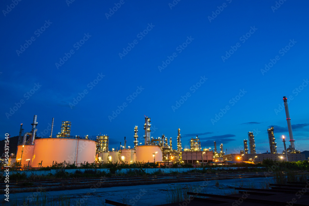 Oil​ refinery​ plant and tower column of Petrochemistry industry in tank oil​ and​ gas​ ​industrial with​ cloud​ blue​ ​sky