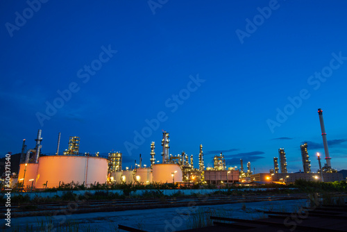 Oil​ refinery​ plant and tower column of Petrochemistry industry in tank oil​ and​ gas​ ​industrial with​ cloud​ blue​ ​sky