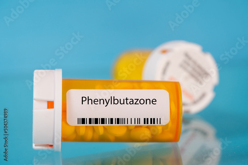 Phenylbutazone. Phenylbutazone pills in RX prescription drug bottle photo