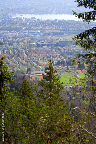 Panoramic view from local mountain Uetliberg over City of Zürich on a blue cloudy spring day. Photo taken April 14th, 2022, Zurich, Switzerland. © Michael Derrer Fuchs