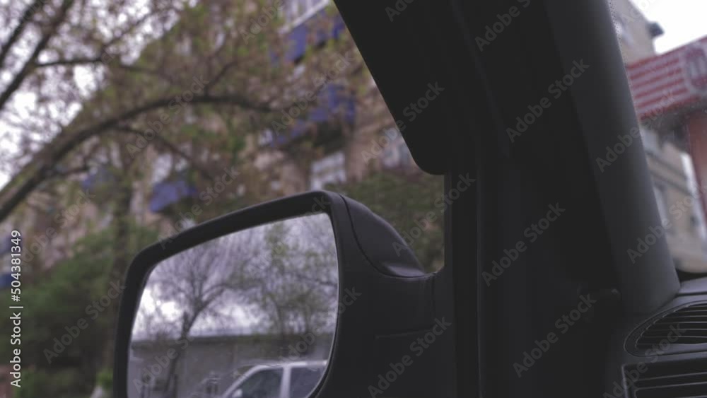 lowering and raising the side window of the car, the operation of the