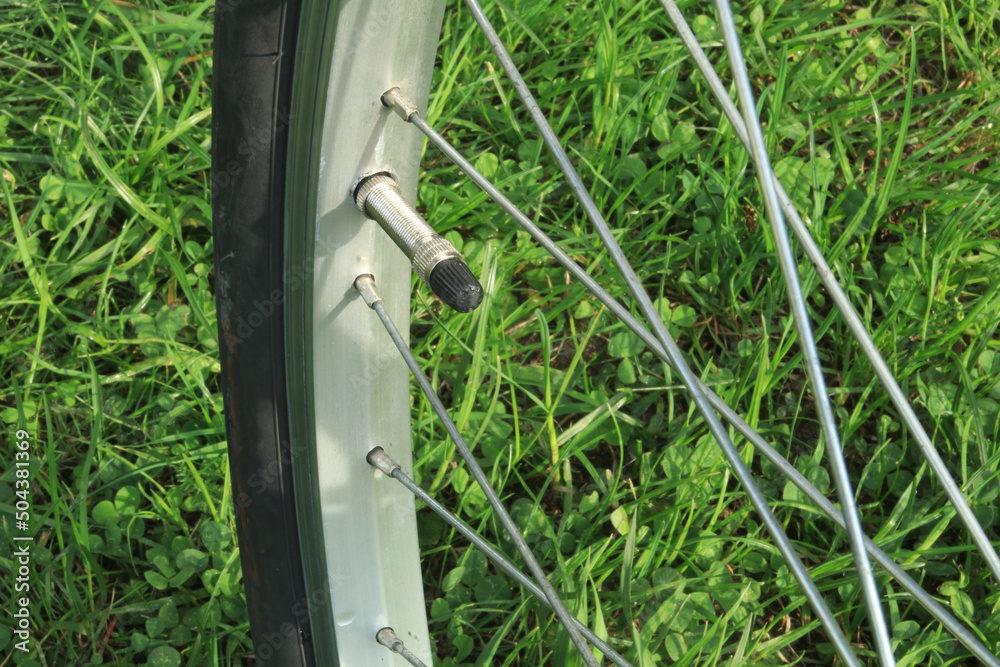Bicycle wheel rim and valve for pumping air Stock Photo Adobe Stock