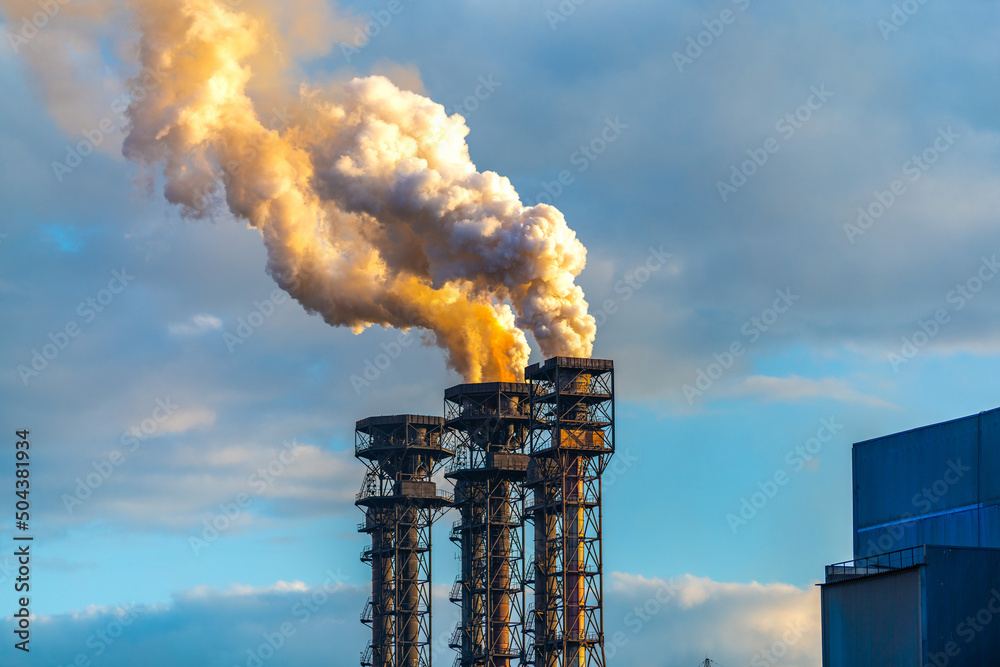 Burning gas torch with thick poisonous smoke. Gas processing and oil