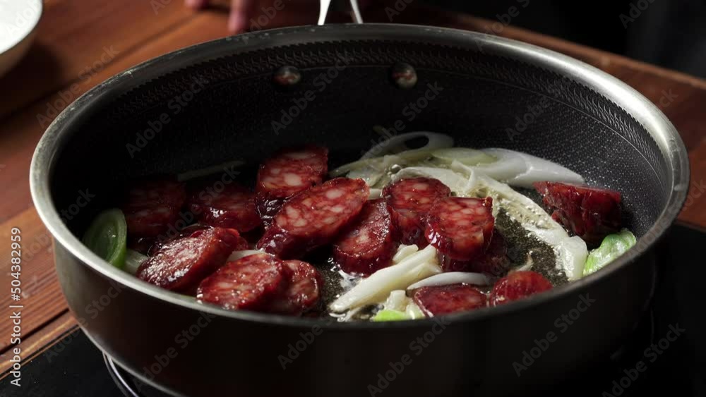 Sichuan-style stir-fried vegetables - stir-fried cabbage with spicy sausage Sichuan-style stir-fried vegetables - stir-fried cabbage with spicy sausage