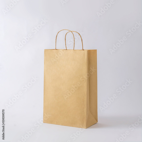Cardboard brown paper bag for shop shopping and business mockup