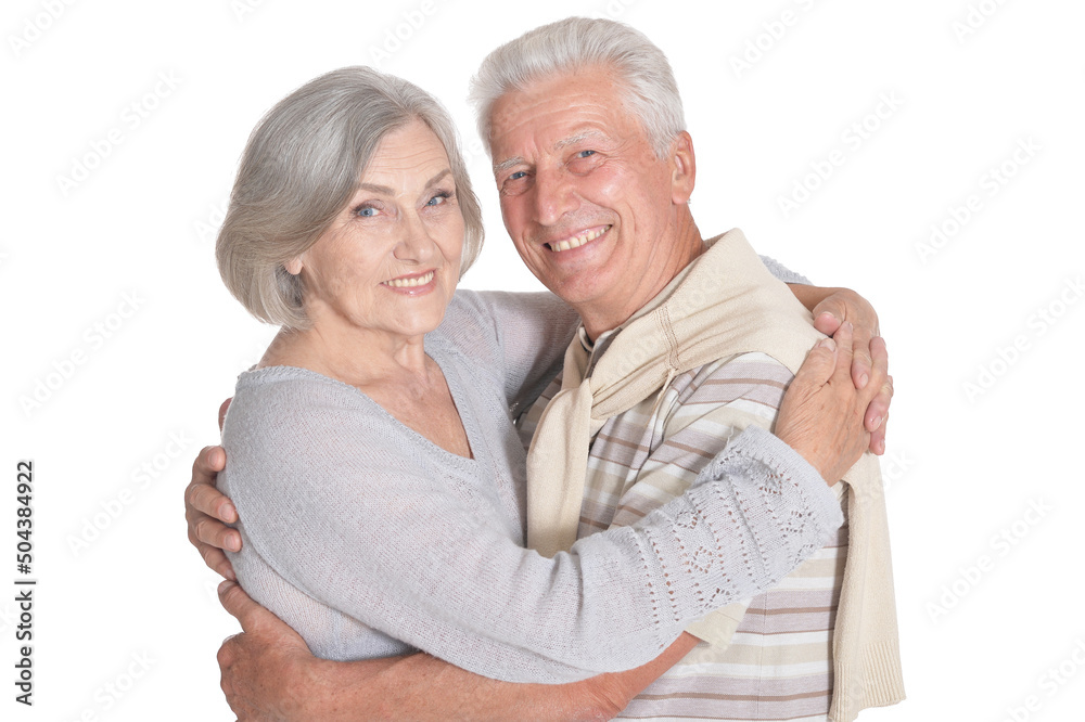 Portrait of happy senior couple hugging on white background Portrait of happy senior couple hugging on white background