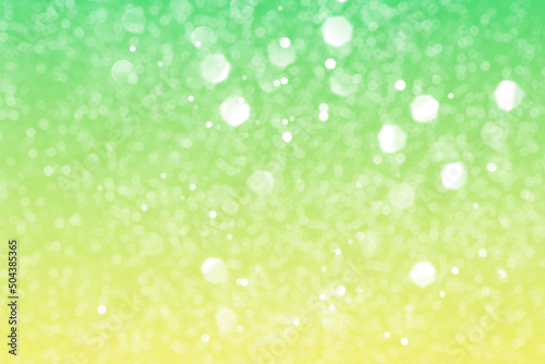 Summer green sparkling glitter bokeh background, abstract defocused lights texture