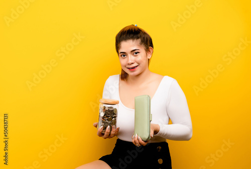 Fotografija Woman with coins and money in purse