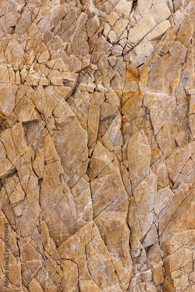 textures and patterns of natural broken rocks and erosion of sea water over time textures and patterns of natural broken rocks and erosion of sea water over time