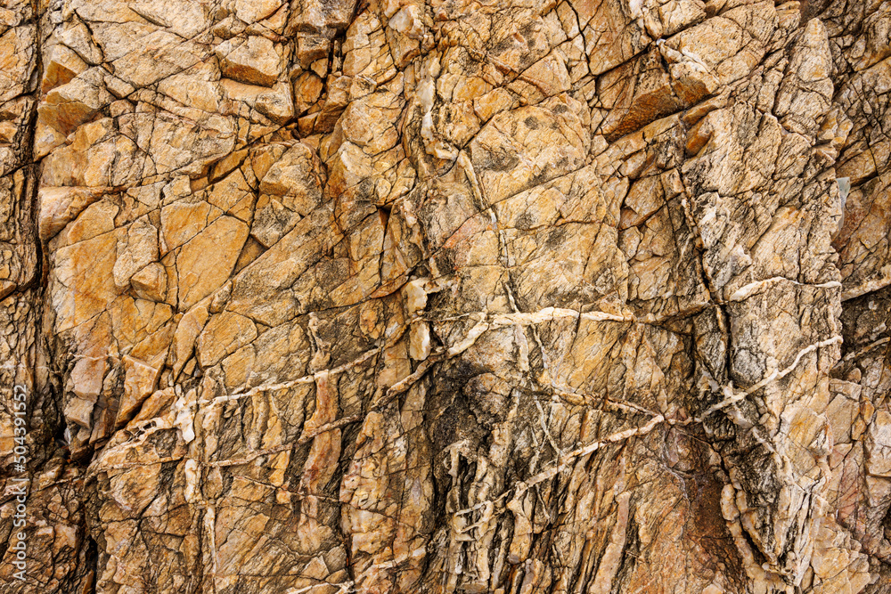 textures and patterns of natural broken rocks and erosion of sea water over time textures and patterns of natural broken rocks and erosion of sea water over time