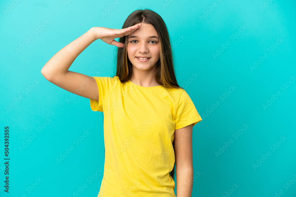 Little girl over isolated blue background saluting with hand with happy expression Little girl over isolated blue background saluting with hand with happy expression