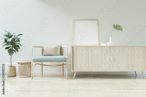 Fototapeta Naklejka Na Ścianę i Meble -  Blank poster on the wall, Living room with rattan chair - 3D Rendering