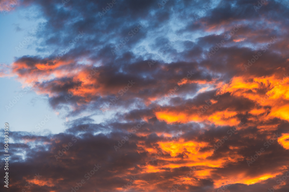 Colorful dramatic cirrus cloud and sky at the sunset