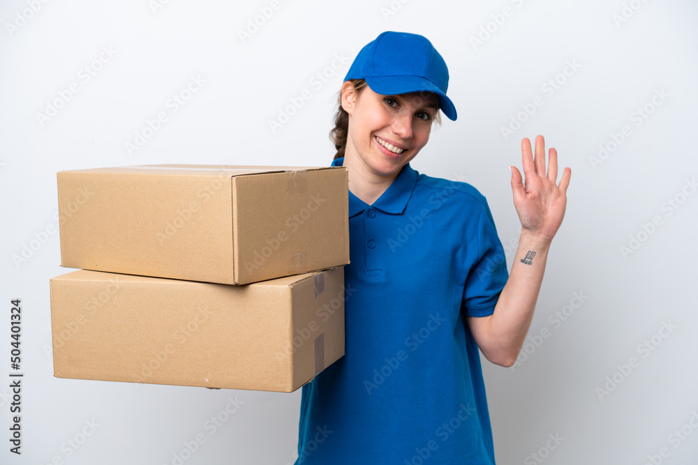 Delivery caucasian woman isolated on white background saluting with hand with happy expression