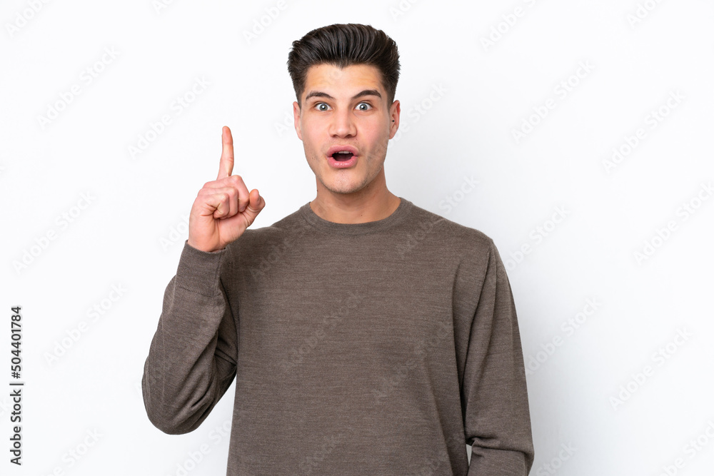 Young handsome caucasian man isolated on white bakcground thinking an idea pointing the finger up Young handsome caucasian man isolated on white bakcground thinking an idea pointing the finger up