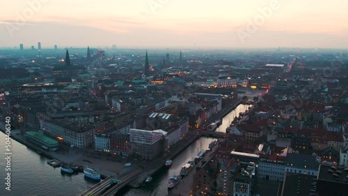 Drone shot over nyhavn channel copenhagen buildings. 60fps photo
