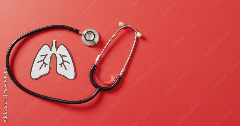 Video of close up of stethoscope with lungs on pink background Video of close up of stethoscope with lungs on pink background