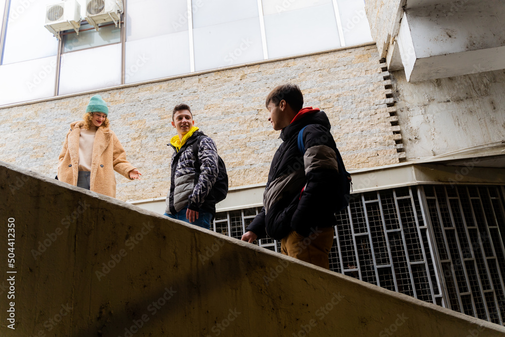 Standing on the stairs and talking Standing on the stairs and talking