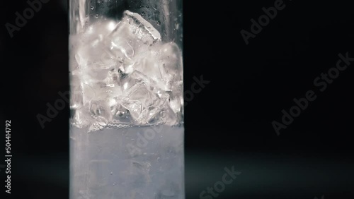 Experienced barman making an alcoholic beverages 