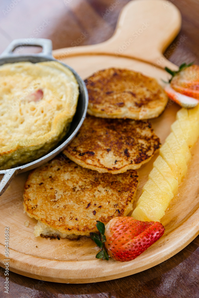 Delicious breakfast with egg and corn cake Delicious breakfast with egg and corn cake
