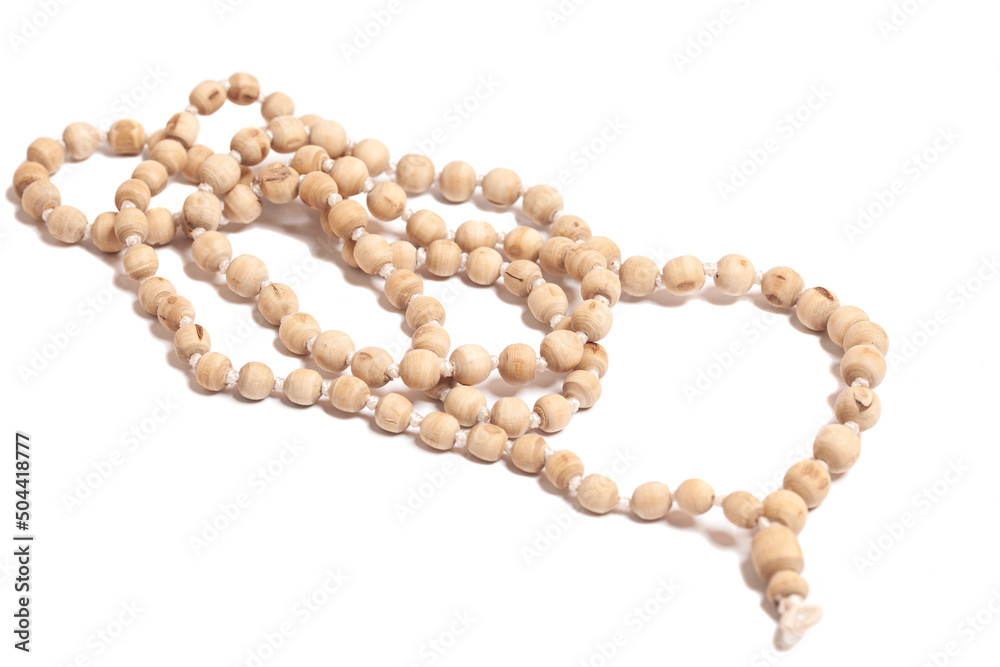 Rosary or prayer beads isolated on white background Rosary or prayer beads isolated on white background