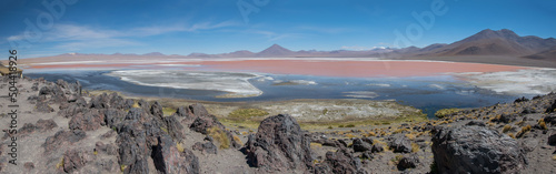 Colorado lagoon  lake with reddish waters in the Salar Uyuni  Bolivian altiplano