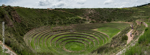 The Incan terraces at Moray Morai Inca Ruin (northwest of Cuzco), Peru photo