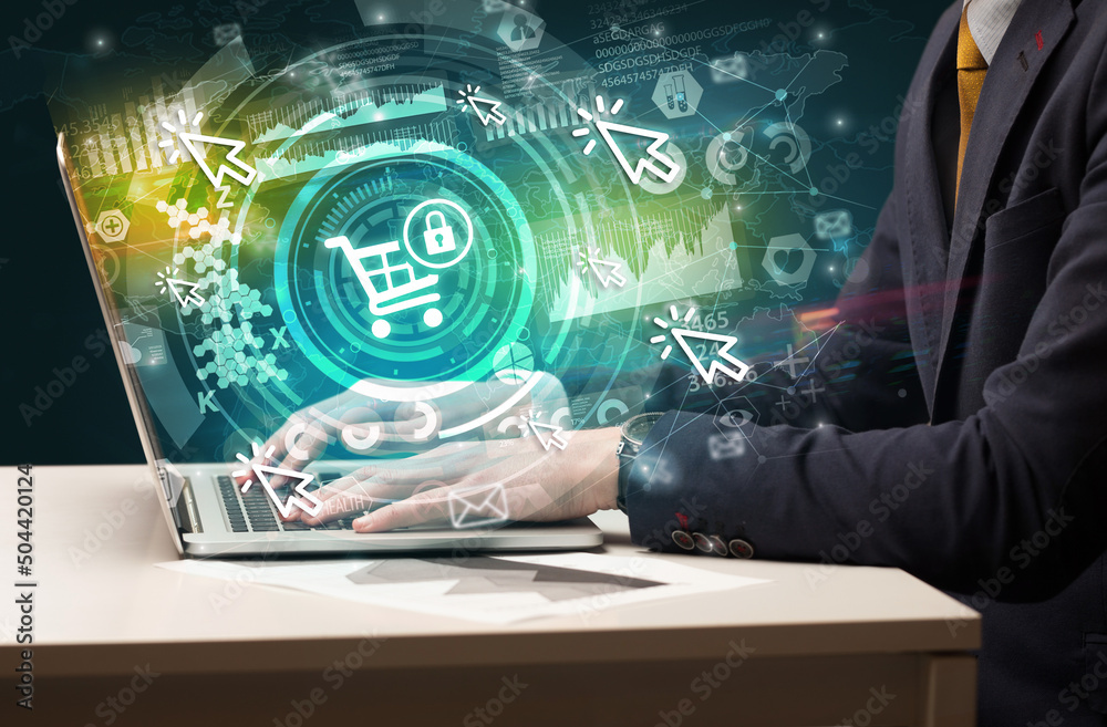 Business hand typing on a modern laptop Business hand typing on a modern laptop
