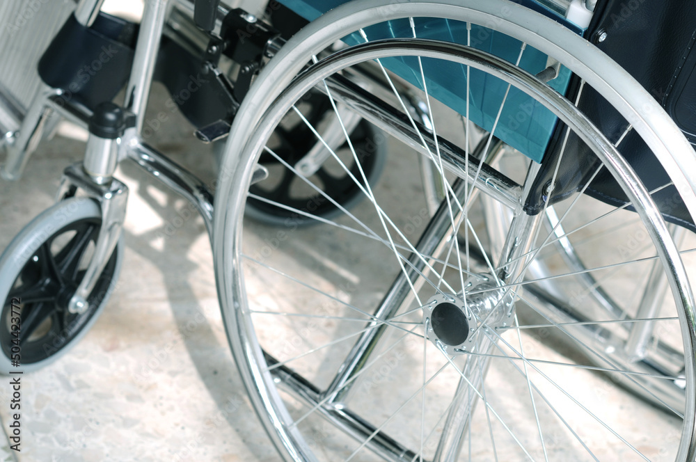 Wheelchair for patients. who can't walk or a sick person who is recovering Sit and spin straight, the wheels will be able to move. use in hospital. Selective focus