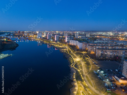 Siberian city of Krasnoyarsk. Top view of the Yenisei River and the Right Bank. Evening shooting