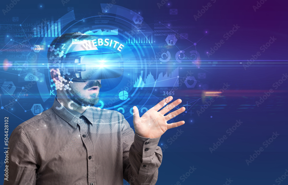 Businessman looking through VR glasses Businessman looking through VR glasses