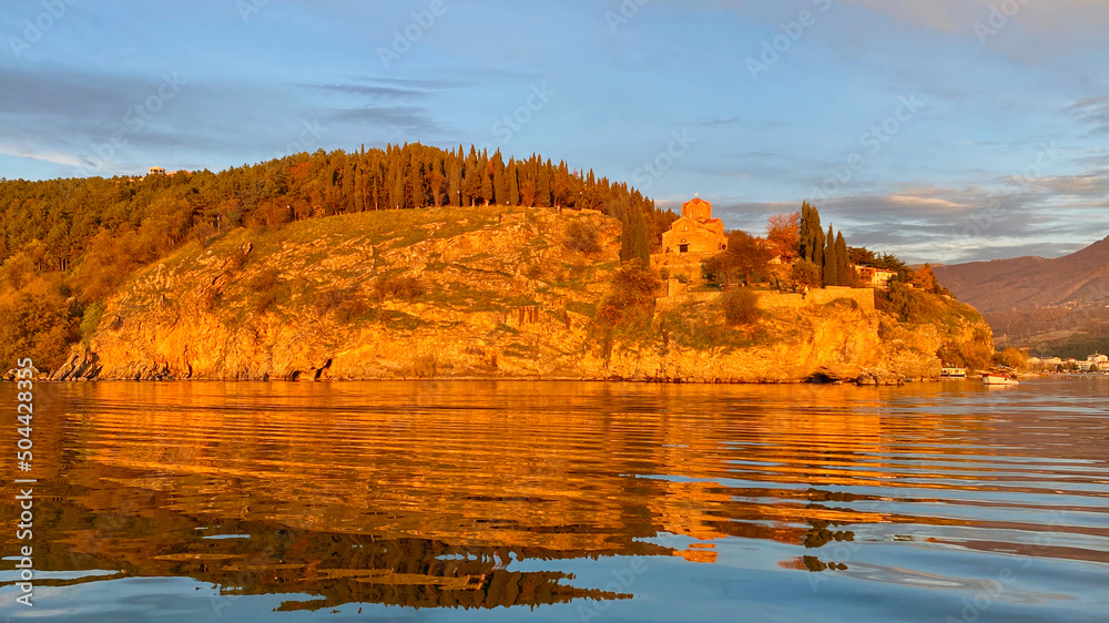 Sunset color on Ohrid Lake with reflection in North Macedonia