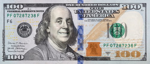 Benjamin Franklin smiling on 100 dollar banknote photo