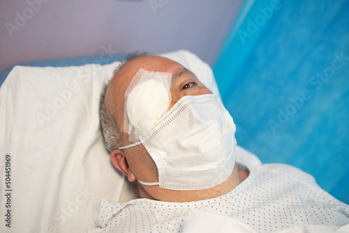 Man in hospital with one eye photo