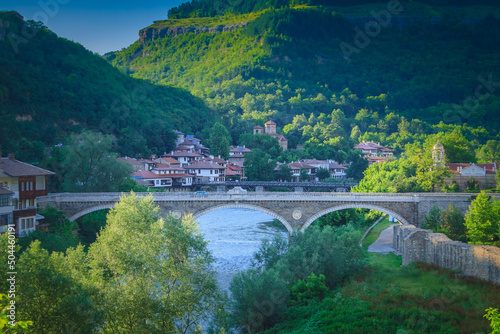 summer view of the ancient bridge in Veliko Tarnovo, Bulgaria photo