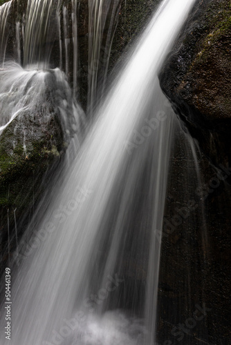 Waterfall on dam stone wall in river inside forest  Araras  Petropolis city  Rio de Janeiro  Brazil