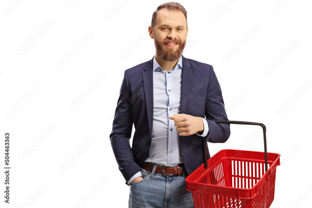 Smiling young man holding an empty shopping basket Smiling young man holding an empty shopping basket