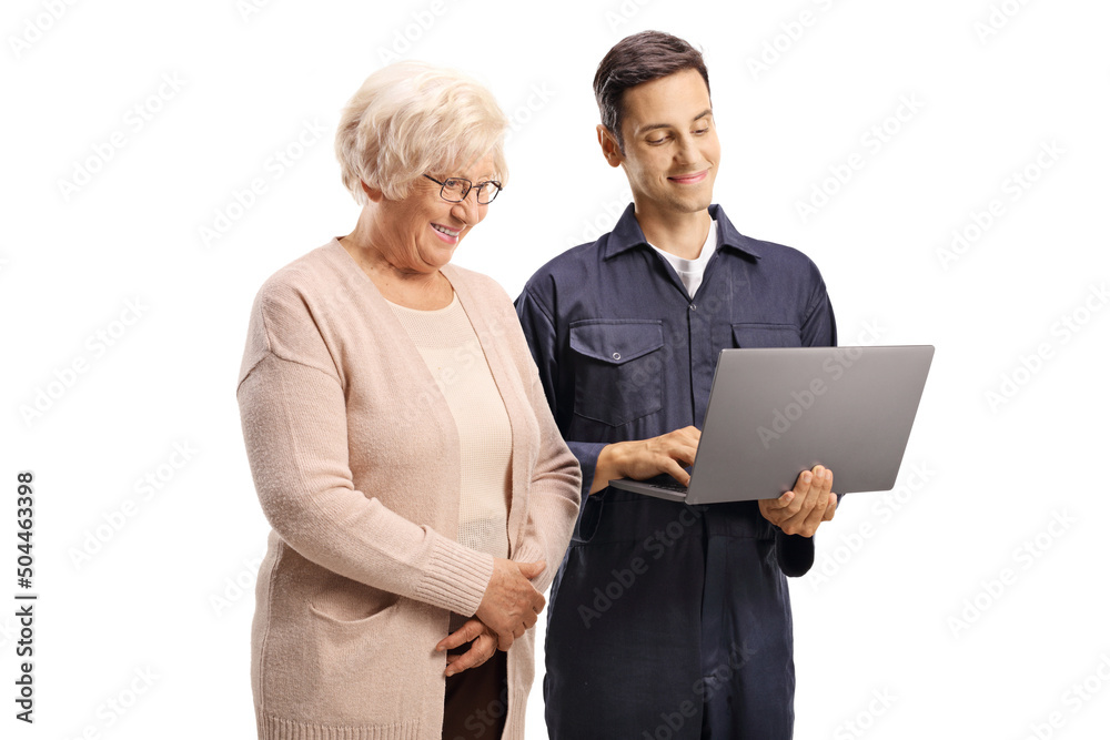 Male worker with a laptop computer showing to a casual elderly woman Male worker with a laptop computer showing to a casual elderly woman