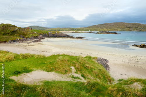 Abbey Island, the idyllic patch of land in Derrynane Historic Park, famous for ruins of Derrynane Abbey and cementery, County Kerry, Ireland photo