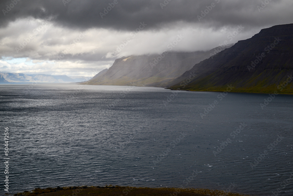 Windy morning and dramatic clouds in Arnarfjörður fjord, Westfjords, Iceland
