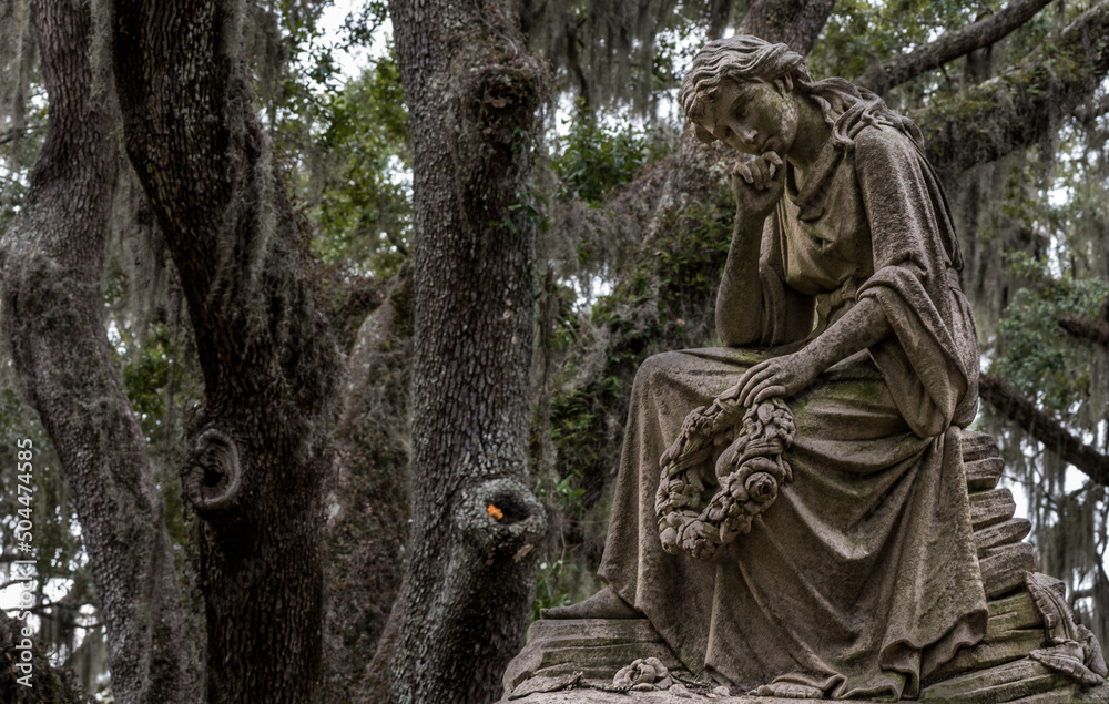 Thinking Woman Holding Wreath Close