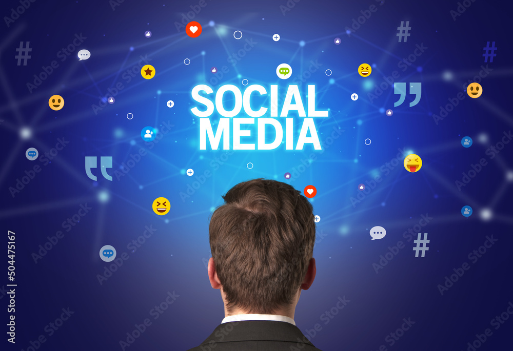 Rear view of a businessman, social media concept Rear view of a businessman, social media concept