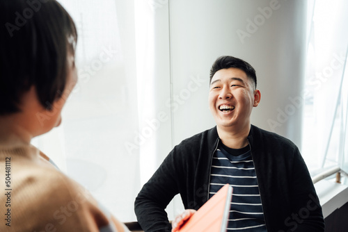 Casual business people talking in office
