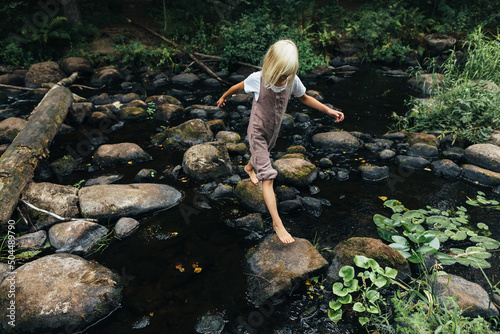 Jump on rocks over the river 