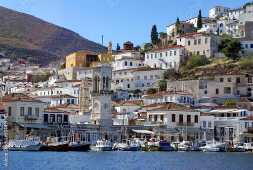 Fototapeta Naklejka Na Ścianę i Meble -  Town on the hill above the harbor on Hydra, Greek Isles