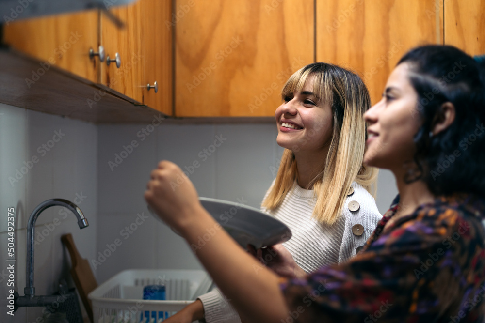Couple doing housework together Couple doing housework together
