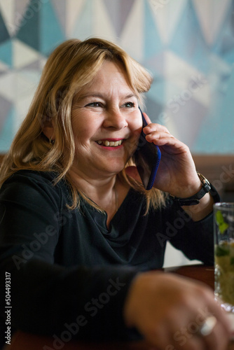 Happy Woman Talking on the Phone