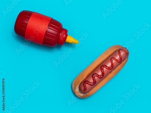 Still life with hot dog and ketchup photo