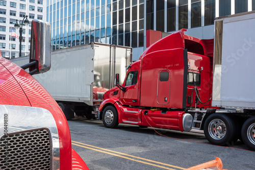 Red tanker trucks shipping photo