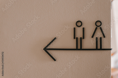 Creative WC sign on wall in restaurant